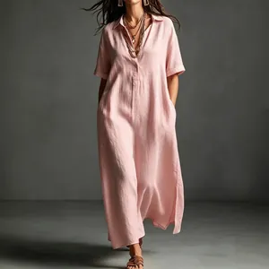 Elegant full-length view of a pink cotton linen maxi dress with V-neck and short sleeves.