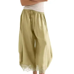 Pantalon large courbe vert olive pour femme avec taille élastique et ourlet en dentelle