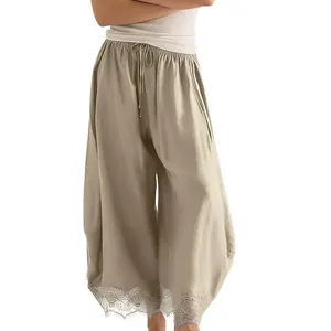 Vue détaillée du pantalon incurvé pour femme avec taille élastique et dentelle