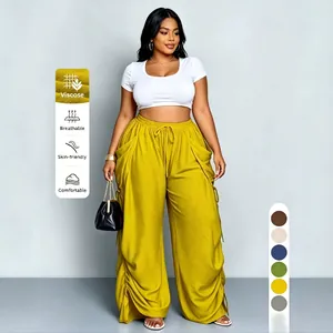 Plus size viscose harembroek met trekkoord in de taille en wijde pijpen in mosterdgeel