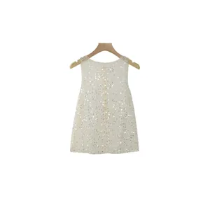 Elegant sleeveless women's tank top covered in shimmering silver sequins for summer