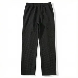 Close-up back view of dark grey men's waffle knit lounge pants with an elastic waistband