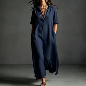 Elegant navy blue cotton linen maxi dress featuring a V-neckline and loose short sleeves
