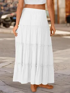 Detailed back view of a white tiered maxi skirt with a stylish ruffled layered design