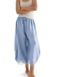 Pantalon large bleu clair pour femme avec taille élastique et bordure en dentelle