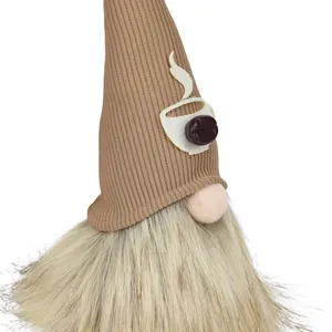 Detailed view of handmade coffee gnome plush with knitted hat and coffee bean decor