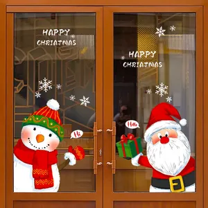 Adesivi natalizi per finestre con Babbo Natale e pupazzo di neve su porta di vetro
