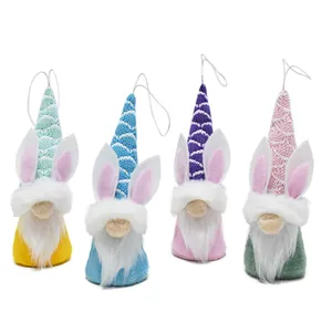 Set of four colorful Easter gnomes with rabbit ears and hanging loops for home decor