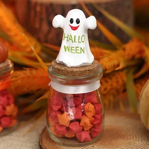 Cute Halloween ghost resin figurine candy jar decoration with folded paper stars