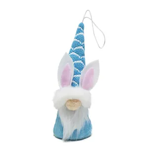 Close-up of Easter gnome hanging ornament with white rabbit ears and blue knitted hat