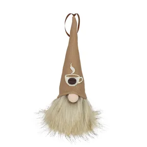Detailed view of handmade coffee gnome plush with ribbed hat and fuzzy beard decoration
