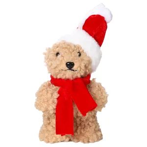 Décoration d'ours en peluche de Noël avec bonnet et écharpe rouges pour le sapin.