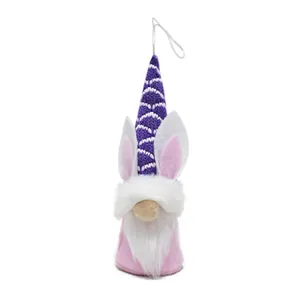 Detailed view of a plush Easter gnome hanging ornament with purple knit hat and bunny ears