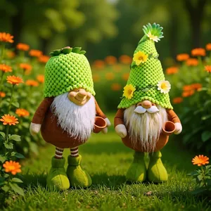 Pair of cute green knitted hat garden gnome figurines in a lush garden setting.