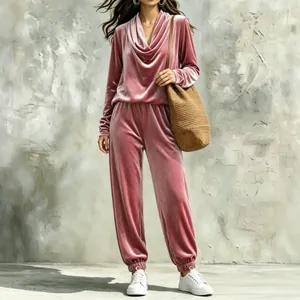 Close-up detail of the elegant rose pink velvet cowl neck top and jogger pants set