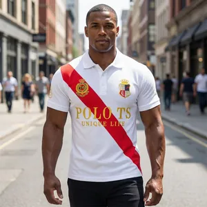 Men's athletic white polo shirt featuring a bold red diagonal sash and gold text detail.