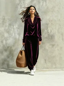 Elegant women's purple velvet lounge set featuring cowl neck top and jogger pants.