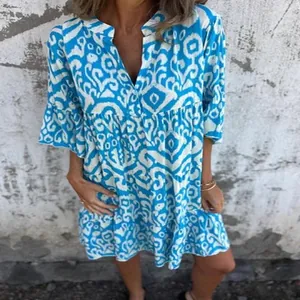 Stylish blue and white printed V-neck bohemian mini dress with ruffled hem detail