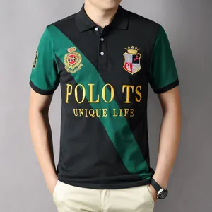 Detailed view of men's short-sleeve polo shirt featuring green diagonal color blocking