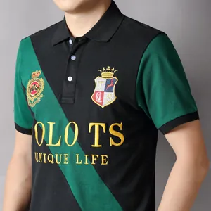 Detailed view of men's polo shirt with embroidered crest and green diagonal stripe.