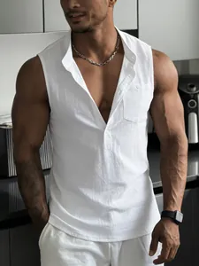 Detail of white linen sleeveless Henley shirt on muscular man showing fit and texture