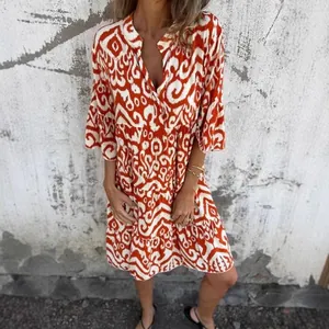 Bohemian orange and white geometric print V-neck pleated summer dress for women