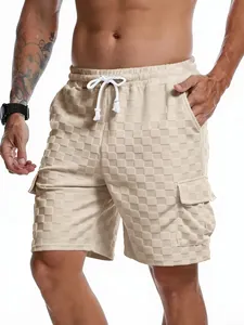 Detailed view of men's beige checkerboard jacquard cargo shorts for summer holiday