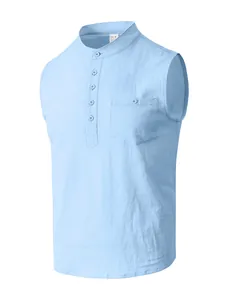 Macro view of light blue linen sleeveless Henley shirt showing fabric texture and pocket detail