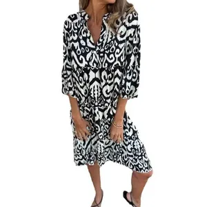 Casual V-neck printed dress featuring a black and white abstract pattern for women