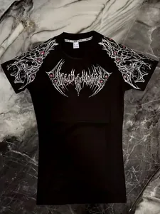 Detailed macro view of Breathedivinity men's compression t-shirt featuring gothic tribal print