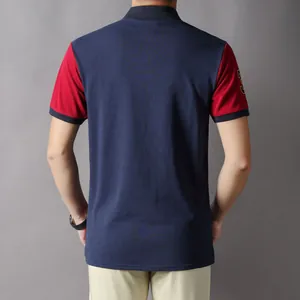 Detailed back view of men's color-blocked cotton polo shirt in navy blue and red colors