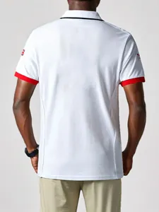 Men's white cotton polo shirt featuring British flag embroidery and red sleeve trim