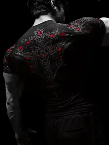 Back view of men's compression T-shirt with intricate dark fantasy red gem print.