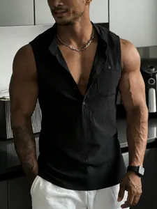 Detail showing a men's sleeveless black linen Henley shirt with a chest pocket feature