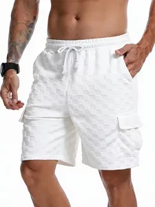 Detail view of men's white shorts with 3D checkerboard jacquard texture and cargo pockets