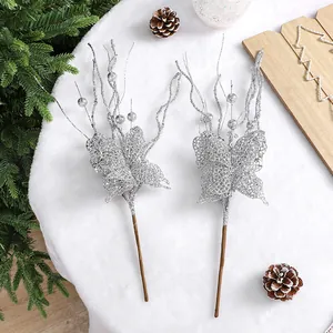 Silver glitter butterfly Christmas picks with berries for DIY tree decoration.