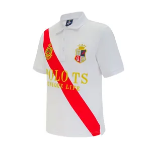 Detail view of men's white polo shirt with red diagonal stripe and crest embroidery