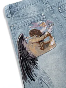 Washed light blue straight jeans with detailed fallen angel embroidery on pocket