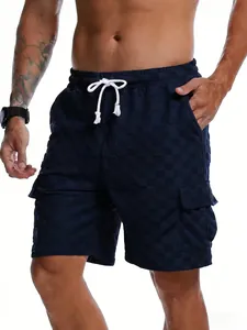 Detail view of men's navy checkered jacquard cargo shorts with white drawstring