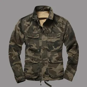 Close-up of a rugged military-style camouflage field jacket with multiple utility pockets