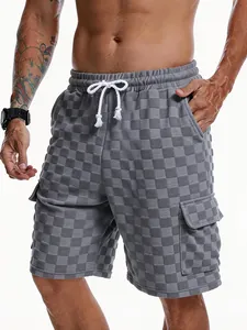 Close-up of men's grey checkerboard jacquard casual cargo shorts with drawstring.