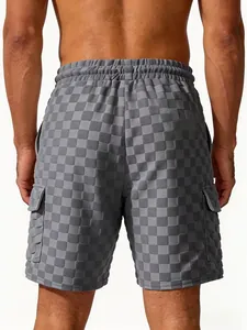 Rear view detail of men's grey checkerboard jacquard casual cargo shorts for summer vacation