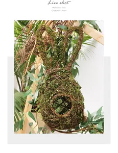 Close-up of rabbit-shaped bird nest wreath made with natural vines and moss