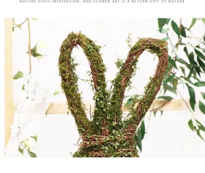 Detailed view of a Nordic style natural vine and moss Easter bunny pendant decoration