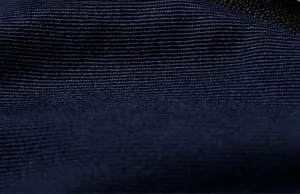 Close-up macro detail showing the navy blue ribbed fabric texture of cargo pants 3357
