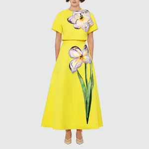 Elegante conjunto amarillo estilo francés de dos piezas con flores 3D y falda de línea A