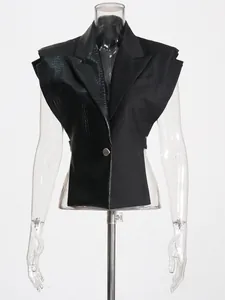 Zwarte mouwloze blazer vest in streetstyle met imitatieleer krokodillen patchwork detail