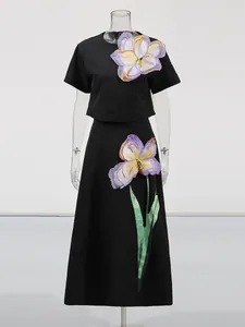 Elegante conjunto de dos piezas estilo francés con flores 3D en el top y falda en A