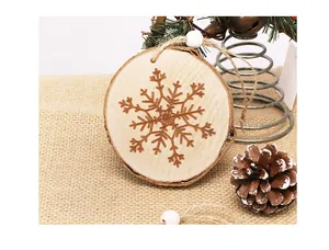 Macro view of rustic wooden snowflake ornament hanging with warm burlap background