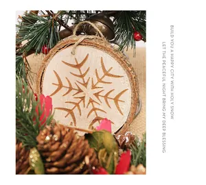 Close-up detail of a natural wooden snowflake ornament hanging on a Christmas tree